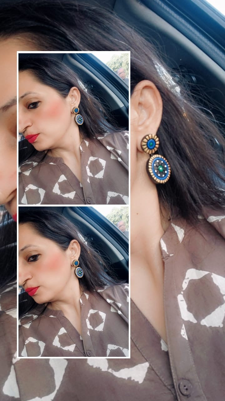 Blue and black earrings in terracotta