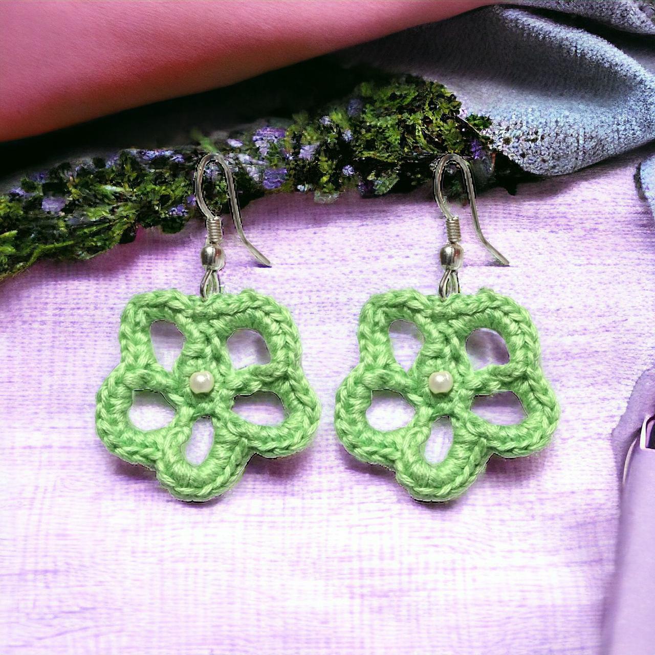 Flower shaped crochet earrings green