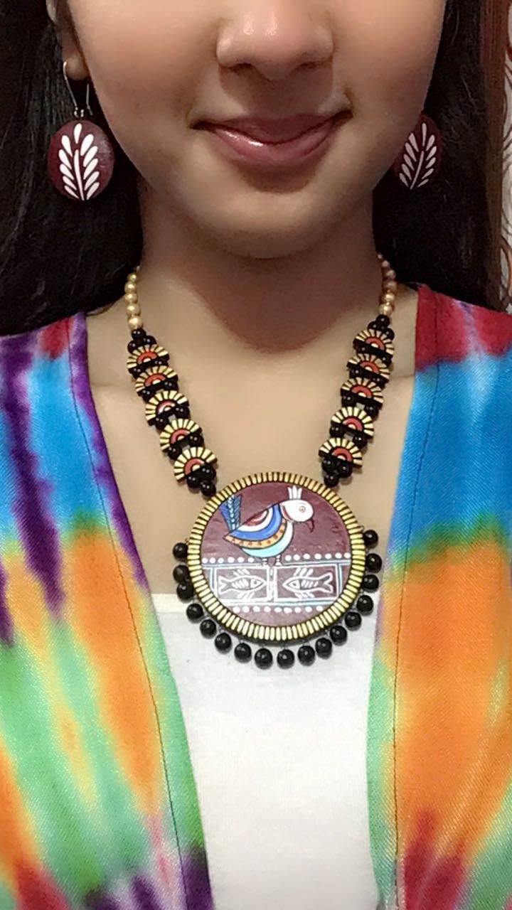 Madhubani designed terrecotta necklace set on maroon base