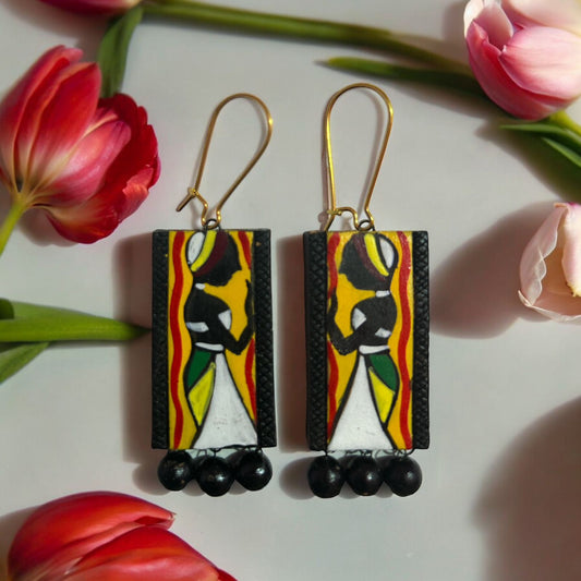 Warli Design black earrings in terracotta