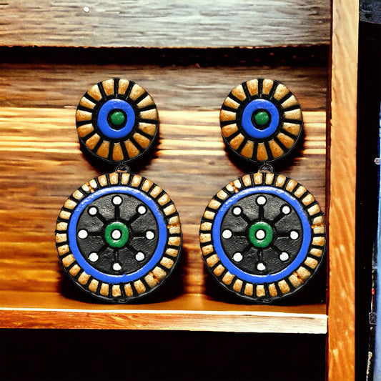 Blue and black earrings in terracotta